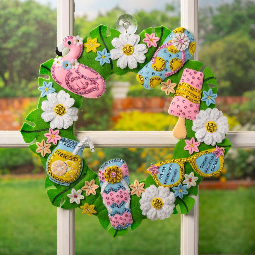 Felt wreath project with pink flamingo, ice pop, flip flops, flowers, lemonade and sunglasses