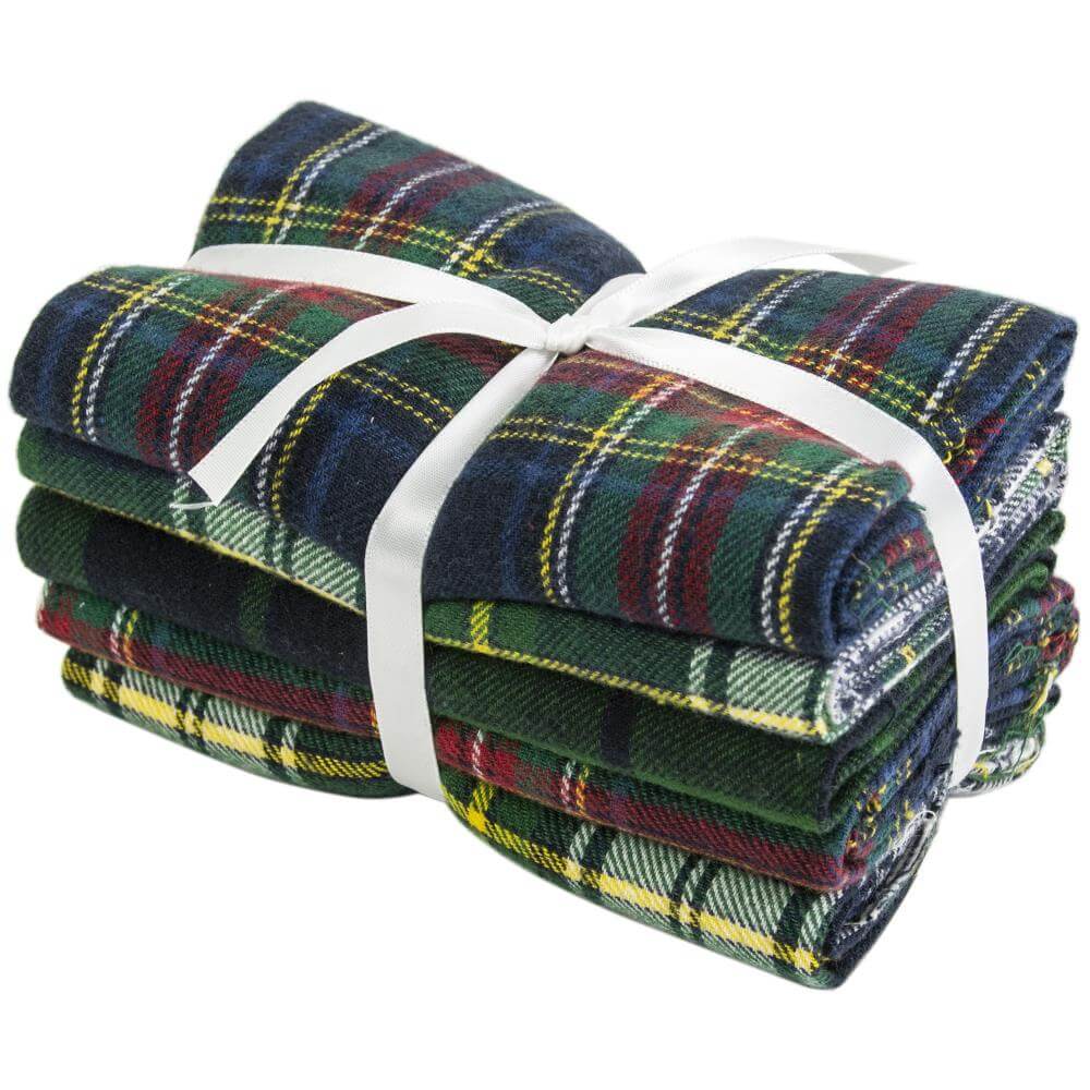 Fat quarter stack of 5 flannel patterns tied in white ribbon
