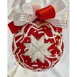 Peppermint candy themed red and white no-sew Christmas ornament with ribbon