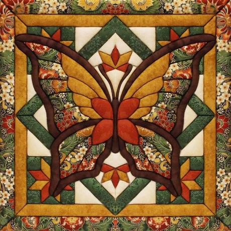 Autumn butterfly no-sew wall hanging quilt kit finished product. Fall colors form a butterfly against a geometric background