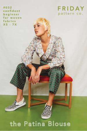 The Patina Blouse is a collared, v-neck, button up top. The sleeves are full and the pattern includes options for a short sleeve or long sleeve