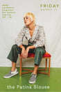 The Patina Blouse is a collared, v-neck, button up top. The sleeves are full and the pattern includes options for a short sleeve or long sleeve