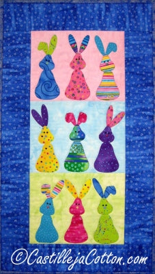 Cute bunnies. Easy to make quilt pattern.   Finished Sizes: 16.5" x 29"