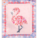 Finished example of South Beach Bella flamingo quilt in pink with purple