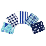 Five flannel fabrics included in the bundle. one with sharks on light blue, one dark blue plaid, one blue and white stripes, one blue plaid, and one navy with white anchors
