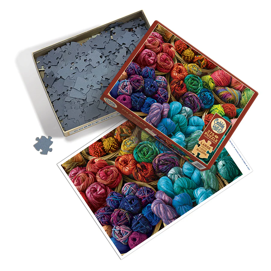 Puzzle box with pieces and poster