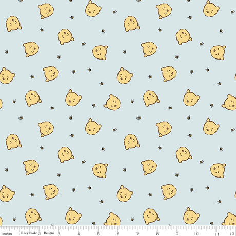 Winnie-the-Pooh Baby Pooh Jumble Blue Quilt Fabric by Echo Park Paper Co. 