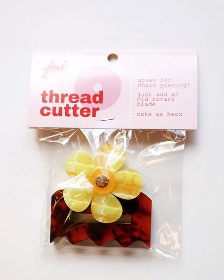 Back of the Retro Flower Thread Cutter by Feral Notions