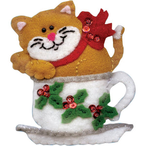 Teacup Cat finished felt applique ornament with tabby cat in a holly-embellished tea cup