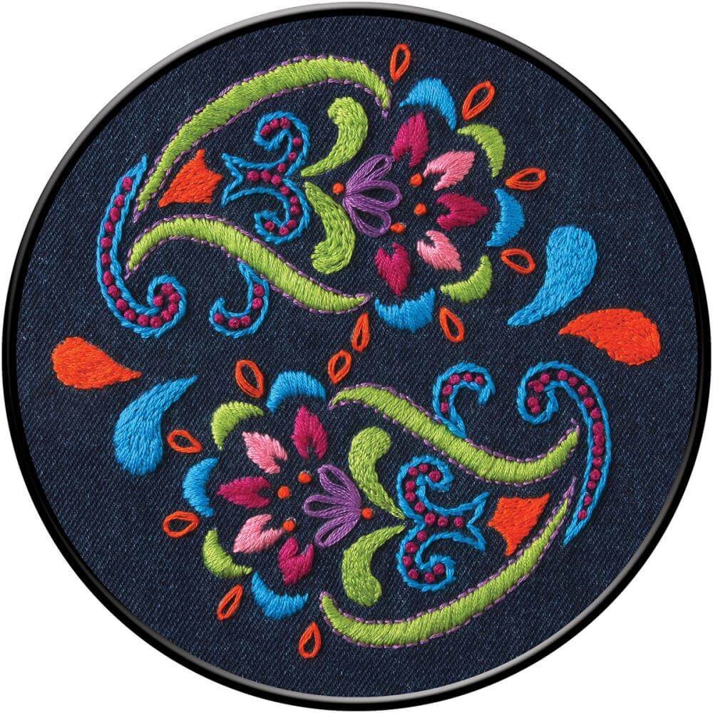 Colorful Bohemian Paisley embroidery design on dark denim