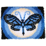 Finished product of Butterfly Moon Latch Hook kit in shades of blue