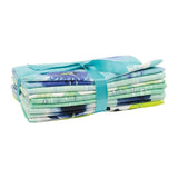 Fat Quarter bundle "Charisma" with blue and green fabrics, tied up with a bright blue ribbon