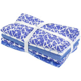 Blue themed fabric fat quarter stack tied in white ribbon