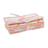 Savannah collection of fabric fat quarters shown stacked with a pink ribbon