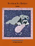 Guilty Quilt Pattern by Trouble and Boo Designs. Shows a dog. 