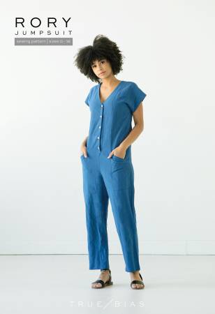 The Rory sewing pattern is a jumpsuit with 4 views. All views have angled patch pockets set into princess seams, a V-neckline and a front button closure.