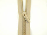 Beige #5 Nylon Gold Coil Zippers: 3 Yards with 9 Pulls by Sallie Tomato