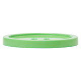 Side view of a green button