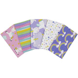 Fabric assortment with unicorns and colorful rainbows and stars
